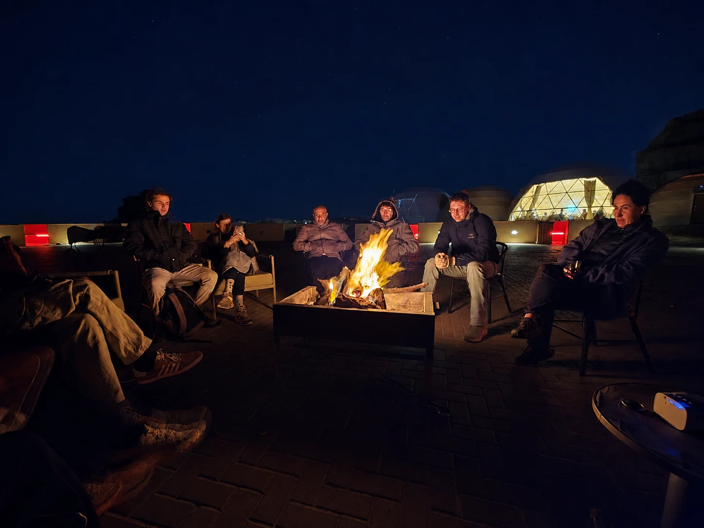 Wadi Rum - Group around fire with Maksim and Guide